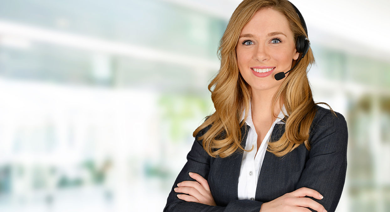 Woman with a phone waiting to speak with someone.